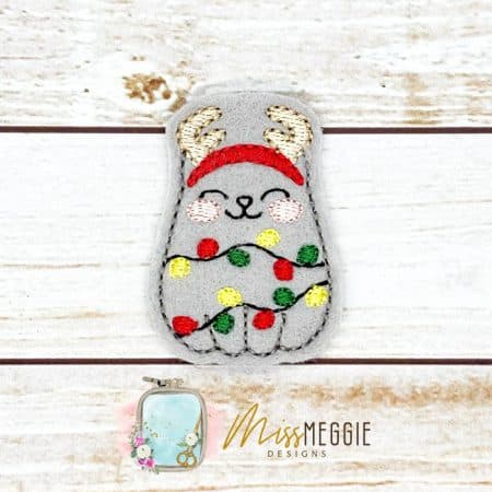 cat wearing antlers wrapped in christmas lights, reindeer kitty feltie ith embroidery design file